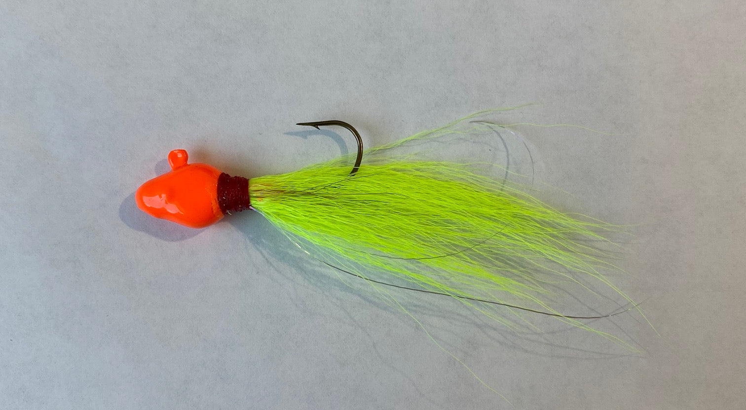 BT 02-Orange Green Buck Tail Jig – Big Eye Spinnerbaits